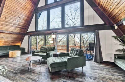 Spacious A-Frame sleeps 25 on 5 wooded acres with a private fishing pond