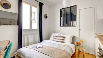 Desk, iron/ironing board, travel cot, free WiFi