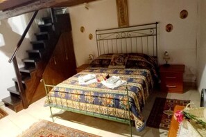 1 bedroom, desk, iron/ironing board, travel cot