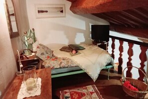 1 bedroom, desk, iron/ironing board, travel cot