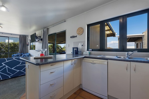 Fridge, microwave, dishwasher, coffee/tea maker