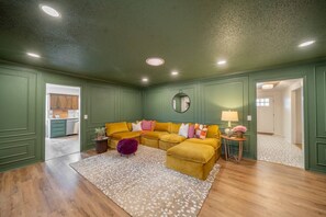 TV, fireplace, books, offices