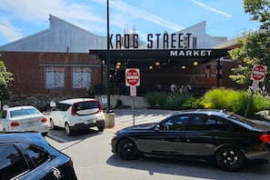 A building with a sign reading "KROBS STREET MARKET" and a "DO NOT ENTER" sign.