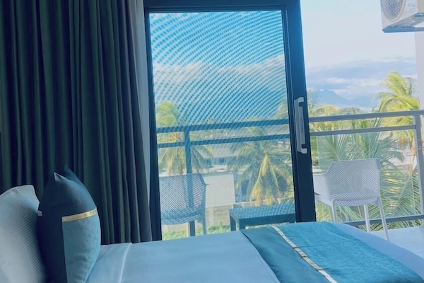 İki Ayrı Yataklı Oda (Garden Oceanview Twin) | Minibar, odada kasa, ayrı ayrı dekore edilmiş, ayrı ayrı döşenmiş