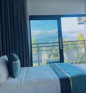 Twin Room (Garden Oceanview Twin) | Minibar, in-room safe, individually decorated, individually furnished