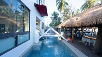 Outdoor pool, open 9:00 AM to 9:00 PM, sun loungers