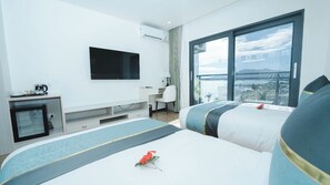 Twin Room (Garden Oceanview Twin) | Minibar, in-room safe, individually decorated, individually furnished