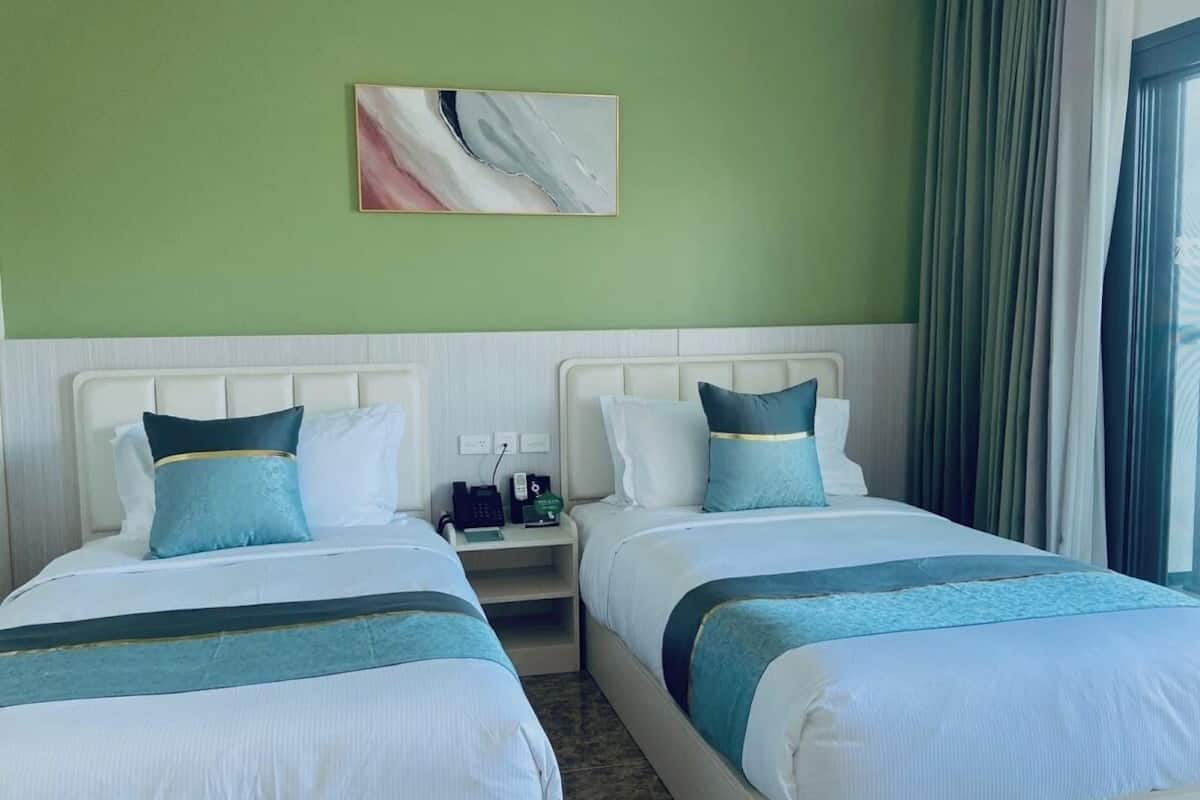Twin Room (Garden Twin) | Minibar, in-room safe, individually decorated, individually furnished