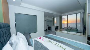 Executive Room, Beachfront | Minibar, in-room safe, individually decorated, individually furnished