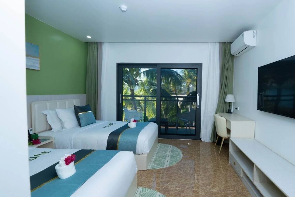 Standard Twin Room (Garden Twin) | Minibar, in-room safe, blackout curtains, iron/ironing board