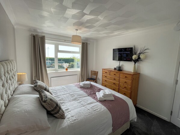 4 bedrooms, iron/ironing board, travel cot, WiFi