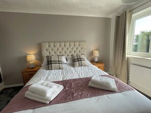 4 bedrooms, iron/ironing board, travel cot, WiFi