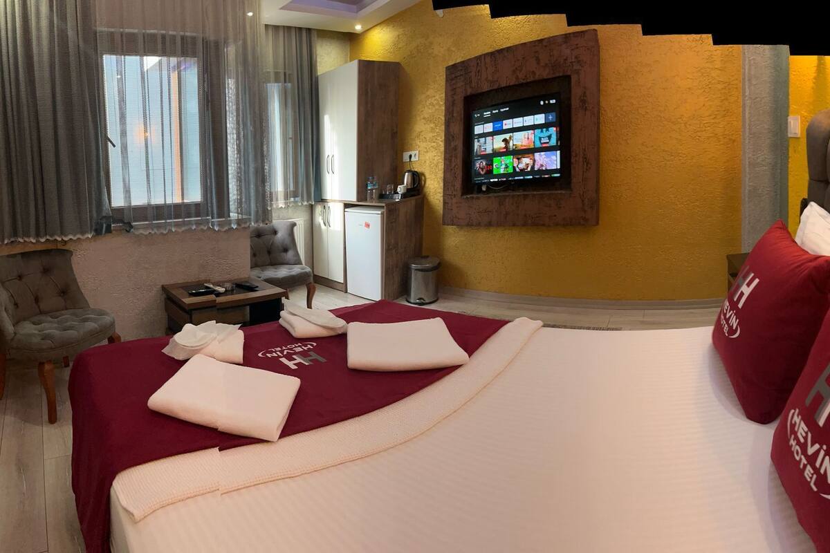Hochwertige Bettwaren, Minibar, laptopgeeigneter Arbeitsplatz