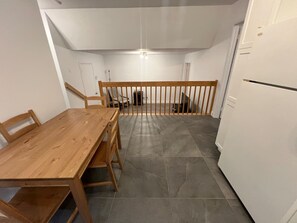 Enjoy meals at the dining table in this cozy kitchen area.