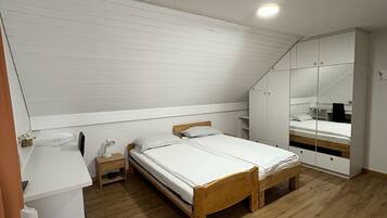 Desk, laptop workspace, free WiFi, bed sheets