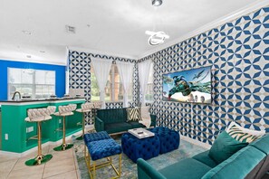 Ferienhaus, 4 Schlafzimmer, Balkon, Blick auf den Golfplatz | Wohnzimmer