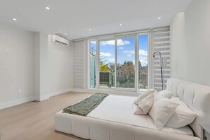 Gallery Condo | 2 bedrooms, premium bedding, iron/ironing board, free WiFi
