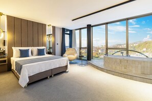 Deluxe Room, Sea View | In-room safe, desk, laptop workspace, iron/ironing board