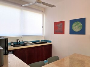 Deluxe Loft, 1 King Bed, Balcony, Courtyard View | Private kitchen | Fridge, microwave, stovetop, blender