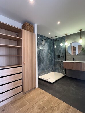 Shower, hair dryer, towels, soap