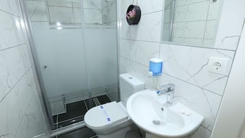 Shower, slippers, towels, soap