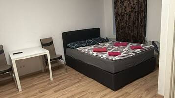 1 habitación y ropa de cama