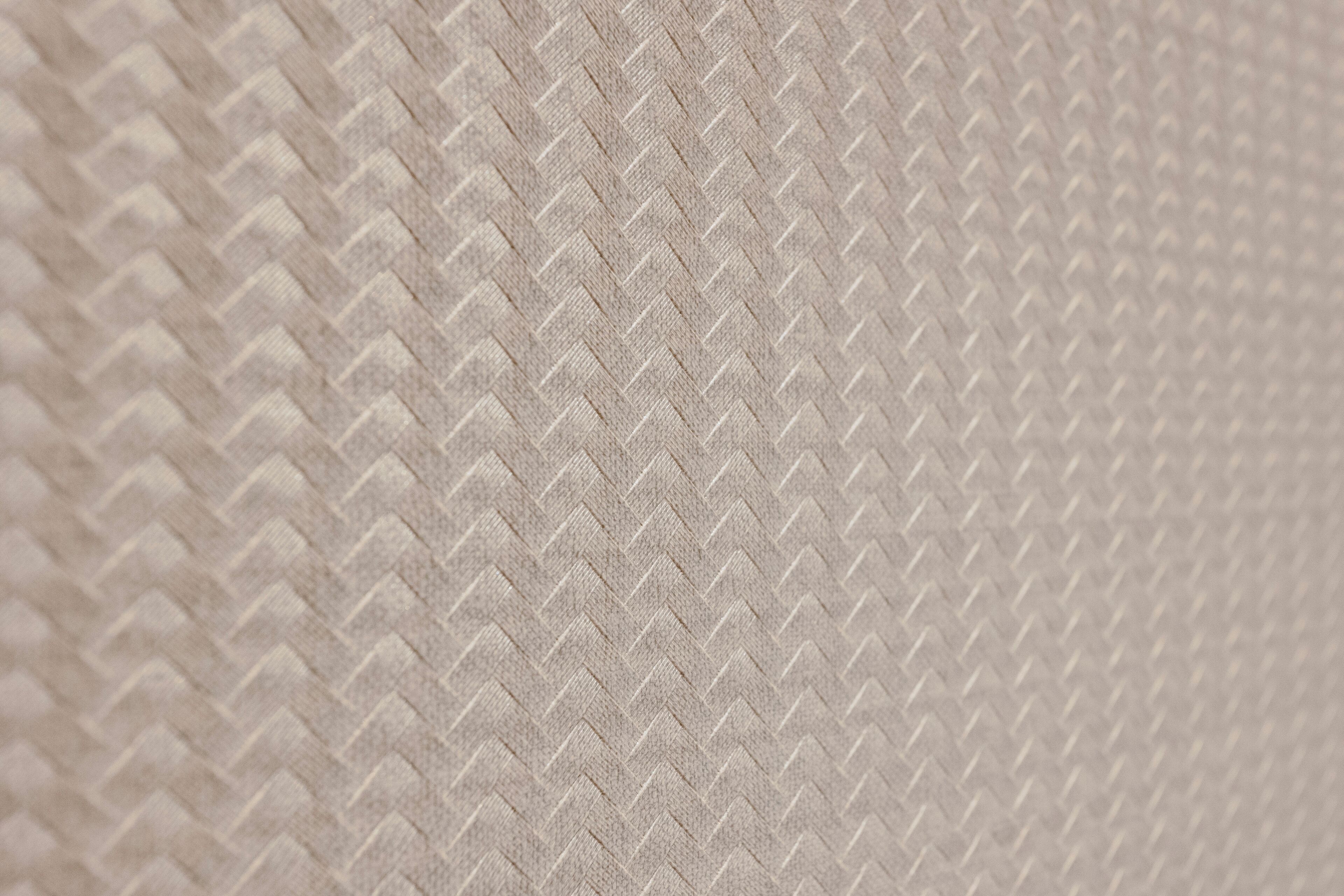 Een detailopname van een geweven textuur.