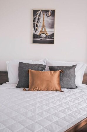 2 habitaciones, tabla de planchar con plancha, wifi y ropa de cama 