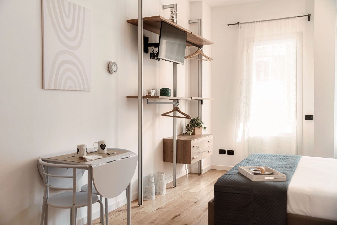 1 habitación, tabla de planchar con plancha, wifi y ropa de cama 