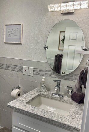 Hair dryer, towels, soap, shampoo