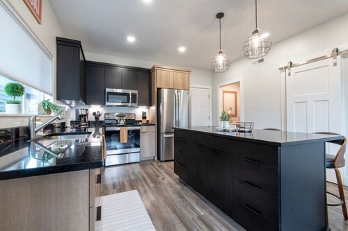 Modern 2-BR Townhome w/ Garage, AC & Workspace
