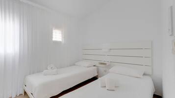 2 slaapkamers, een strijkplank/strijkijzer, gratis wifi, beddengoed