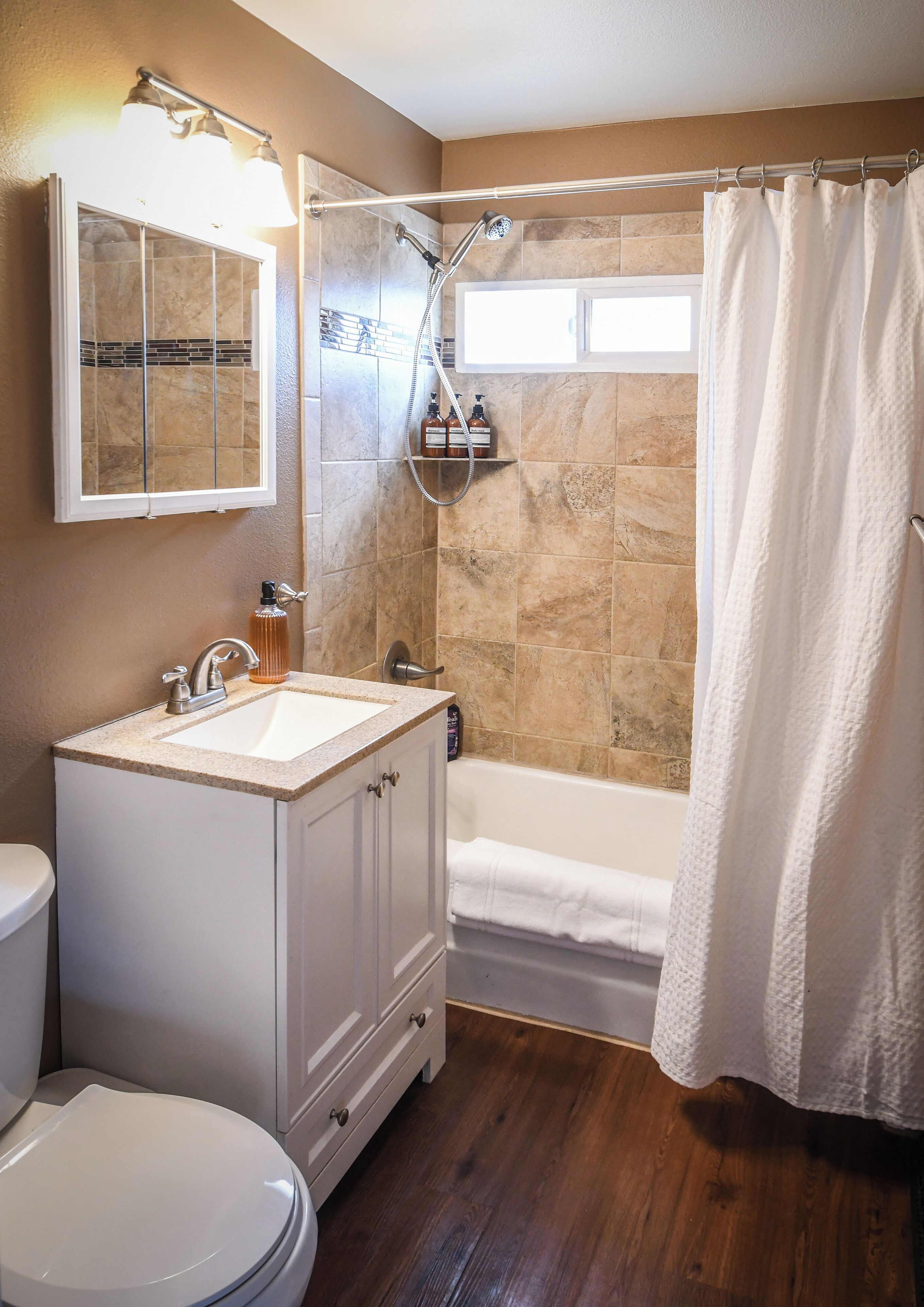 Hair dryer, towels, soap, toilet paper