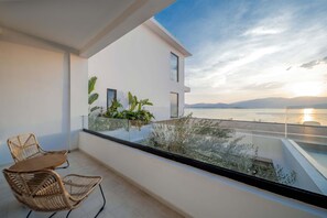 Deluxe Triple Room, Sea View | Terrace/patio