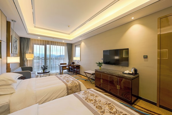 Premium bedding, memory foam beds, desk, laptop workspace