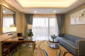 Premium bedding, memory foam beds, desk, laptop workspace