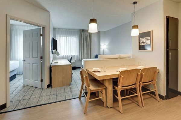 Step into an airy suite with space to dine together.