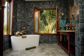 House, 1 Bedroom | Bathroom | Separate bathtub and shower, hair dryer, bathrobes, slippers