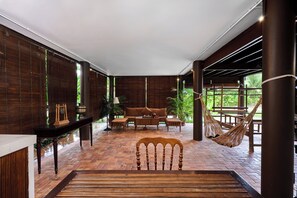 House, 1 Bedroom | Living area | 44-inch Smart TV with digital channels, fireplace, heated floors - Phoum Chaufea Resort (Siem Reap)