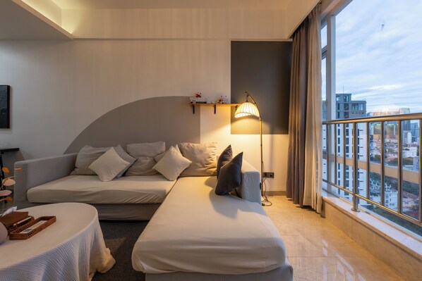 Design Apartment, 2 Bedrooms, City View | Living area | 43-inch Smart TV with digital channels - Yue Tai Apartment City Center by Soben (Phnom Penh)
