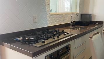 Microwave, oven, stovetop, coffee/tea maker