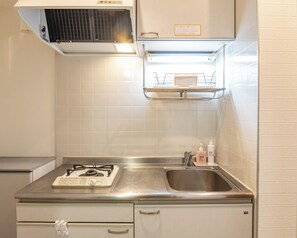 Fridge, microwave, stovetop, cookware/dishes/utensils