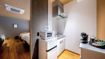 Fridge, microwave, cookware/dishes/utensils