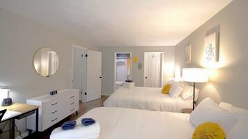 1 bedroom, desk, iron/ironing board, travel crib