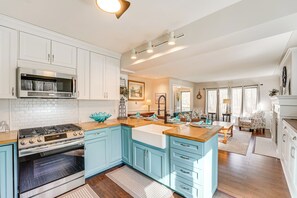 Fridge, microwave, oven, stovetop - 3 Mi to Duck Lake State Park: Home w/ Deck! (Muskegon)