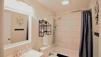 Hair dryer, towels, soap, shampoo