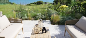 Downderlin is a light-filled beautiful home with a large garden that rolls directly onto the beach.