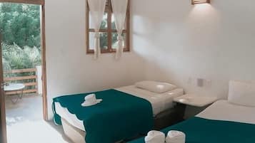 Habitación superior | Muebles diferentes, wifi gratis y ropa de cama