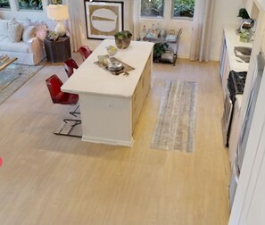 Enjoy meals in the spacious kitchen with a central island and dining area.
