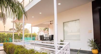 Luxurious 4BHK Farmhouse Retreat with Private Pool